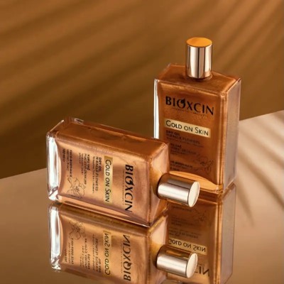 روغن مرطوب کننده و شاین صورت و بدن و مو بیوکسین Bioxin مدل Gold On Skin حجم 100 میل روغن مرطوب کننده و شاین صورت و بدن و مو بیوکسین Bioxin مدل Gold On Skin حجم 100 میل